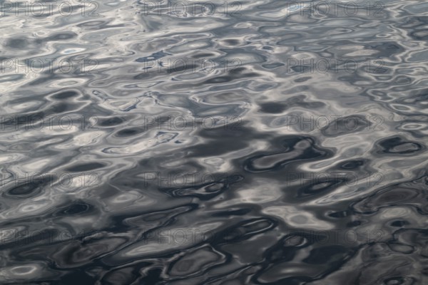 Small waves, clouds reflected in the sea, sea surface, Baltic Sea