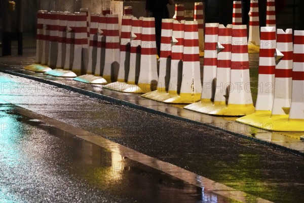 Security barrier for an event, large city at night, Germany