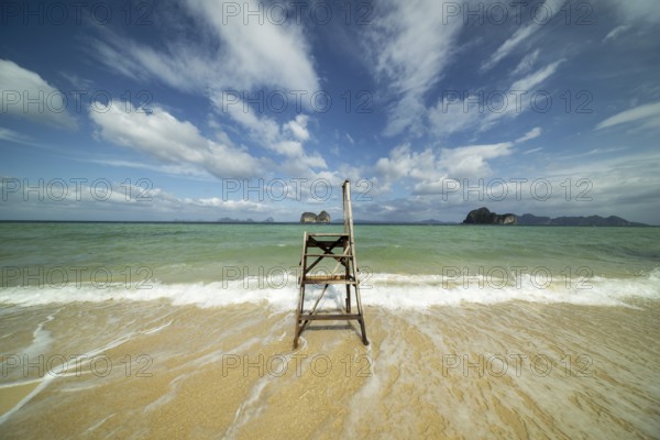 A lonely boarding and disembarking ladder for longtail boats on the beach of Koh Ngai Island, Andaman Sea, Satun Province, Southern Thailand, Thailand