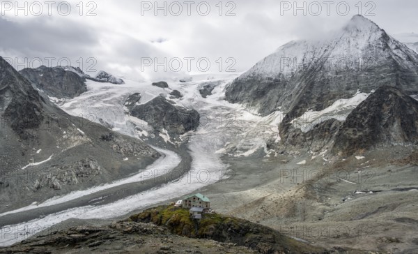 Mountain hut Cabane des Dix in front of glacier Glacier de Cheilon and summit Mont Blanc de Cheilon, Valais Alps, Valais, Switzerland