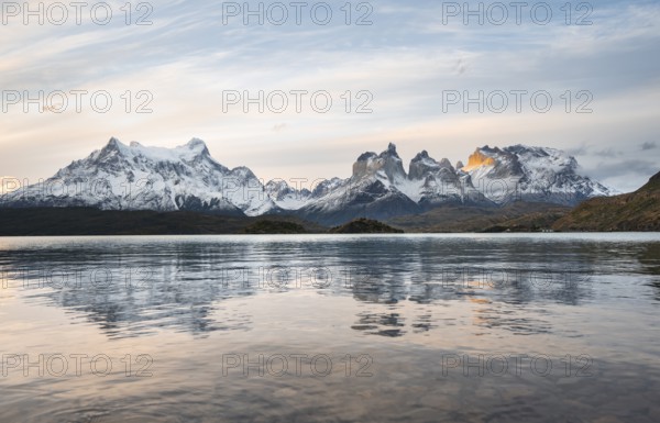 Cuernos del Paine mountain range at sunset, reflection in Lago Pehoe, Torres del Paine National Park, Chile