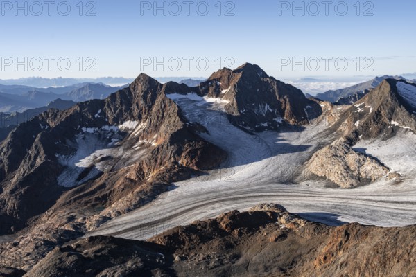 Picturesque high mountain landscape at sunrise, glacier and rocky mountain peaks in the morning light, view of the Königshofspitz mountain peak and Übeltalferner glacier at Becher, Stubai Alps, South Tyrol, Italy
