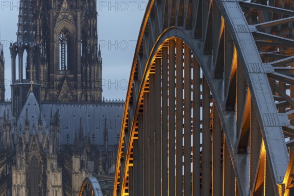 Cologne Cathedral and the Hohenzollern Bridge illuminated with LED lights, Cologne, North Rhine-Westphalia, Germany