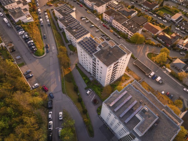 View from above of a town with residential buildings and streets during sunset, Nagold, district of Calw, Germany