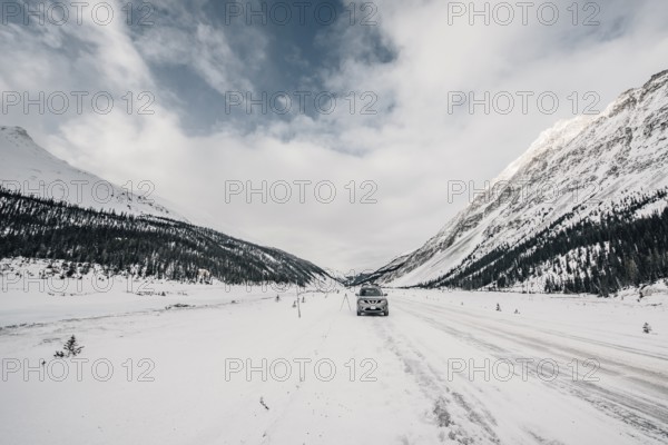 Winter road trip on the Icefields Parkway with lots of snow and ice, Banff National Park, Jasper National Park, Alberta, Canada