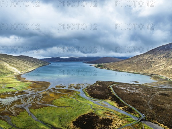 View from Eas a' Bhradain Waterfall from drone, Red Cuillin mountains, Loch Ainort, Isle of Skye, Scotland, UK