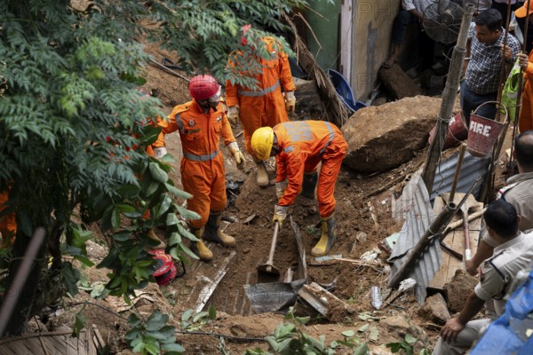 Rescue operations by the National Disaster Response Force (NDRF) and police are in full swing after a major landslide, triggered by a heavy downpour, in Guwahati, India, on June 7, 2025. One person was reported missing in thr landslide and two houses damaged