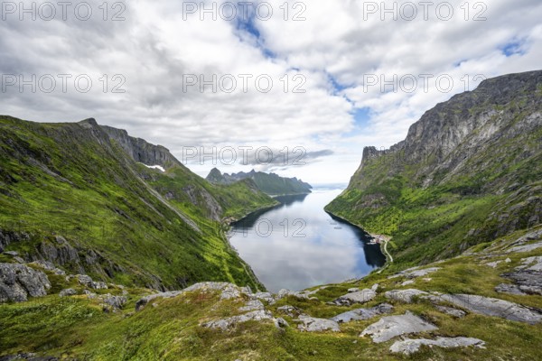 View of Øyfjorden fjord and mountains, fjord landscape with mountain peaks, hike to Barden mountain, Senja, Norway