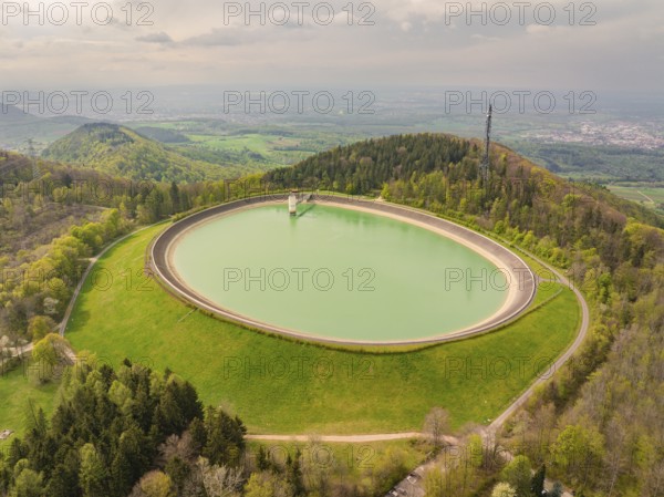 Upper reservoir, water reservoir embedded in a green and wooded landscape, Glems reservoir, Swabian Alb, Germany