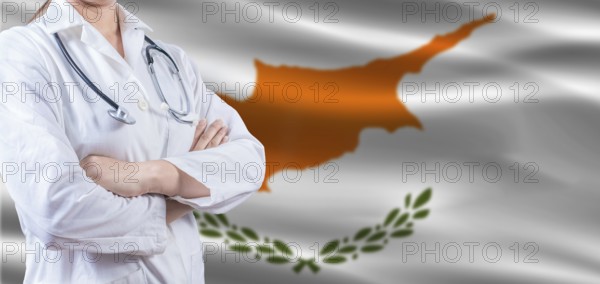 Doctor with crossed arms on Chipre flag. Chipre health and care concept. Female doctor on Chipre flag