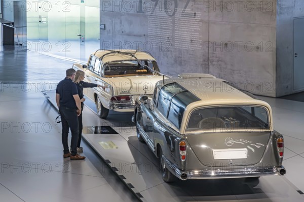 Mercedes-Benz 300 test vehicle from 1960, a one-off from the testing department. Data transmission from the test vehicle, in this case a 220 S, via a long cable. The Mercedes-Benz Museum in Stuttgart presents a journey through time through the automotive history of the global corporation. The history of the Mercedes star begins with the first automobile in 1886. Stuttgart, Baden-Württemberg, Germany