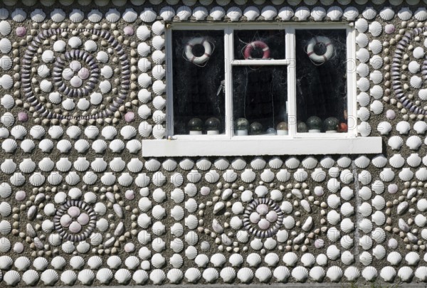 A house wall with a shell pattern and a window, artistically decorated, Hammavoe, Shetland Islands, Scotland, Great Britain