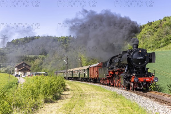 Steam train of the Sauschwänzlebahn steam railway railway steam locomotive at Epfenhofen station in Blumberg, Germany