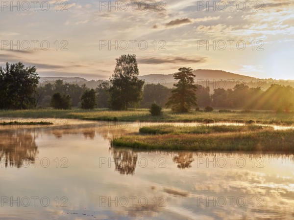 Sunrise at a pond in the Schoren nature reserve, Mühlau, Freiamt, Canton Aargau, Switzerland