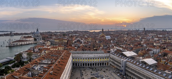 Panorama, St Mark's Square and Basilica di Santa Maria della Salute on the Grand Canal at sunset, view from the Campanile di San Marco bell tower, city view of Venice, Veneto, Italy