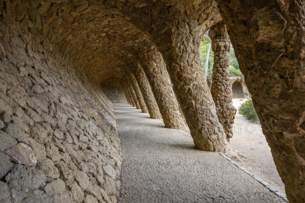 Colonnaded footpath, Park Gueell, Antonio Gaudi architect, Unesco World Heritage Site, Gracia District, Barcelona, Catalonia, Spain