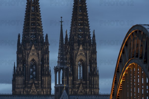 Cologne Cathedral and the Hohenzollern Bridge illuminated with LED lights, Cologne, North Rhine-Westphalia, Germany