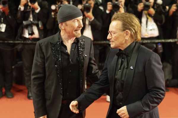 Cannes, France - 16.5.2024: The Edge and U2 singer Bono during the Bono: Stories Of Surrender red carpet during the 78th Cannes International Film Festival. The film festival takes place from 13 to 24 May 2025
