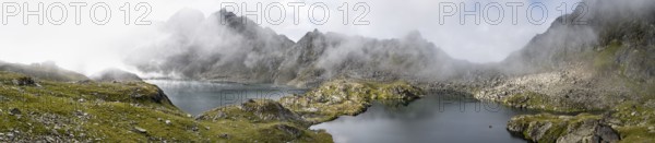 Mountain lakes Wangenitzsee and Kreuzsee, cloudy mountain peaks in the morning, Schober group, Hohe Tauern National Park, Carinthia, Austria