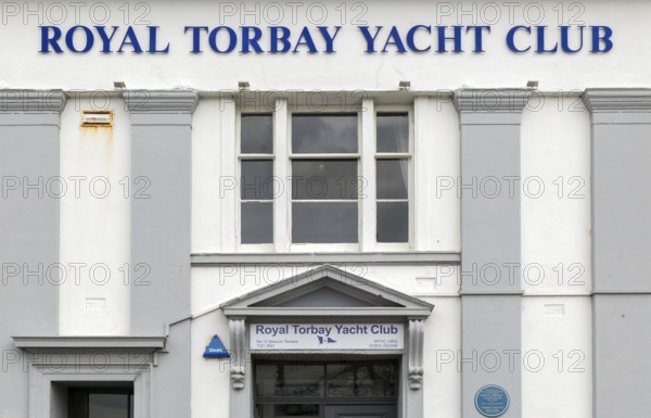Royal Torbay Yacht Club sign on building, Torquay, Devon, England, UK
