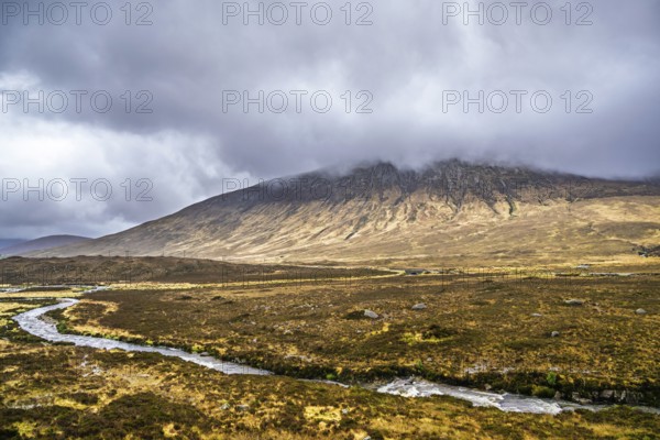 Eas a' Bhradain waterfall, Red Cuillin mountains, Loch Ainort, Isle of Skye, Scotland, UK