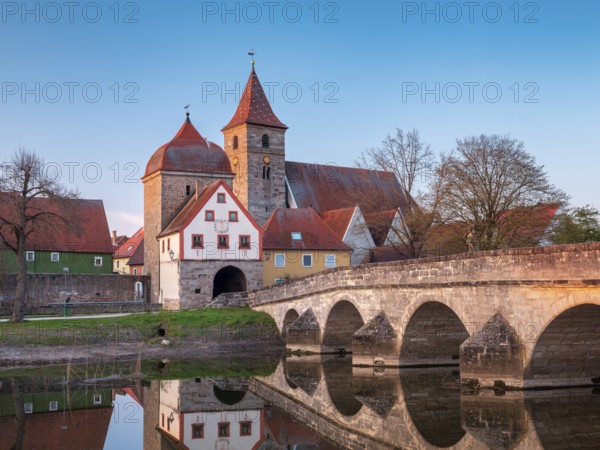 Ornbau in the evening light, medieval stone bridge over the river Altmühl, Altmühl bridge, town gate and parish church of St James, Ornbau, Middle Franconia Bavaria Germany