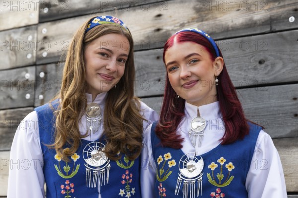 Young woman in traditional traditional costume at the reception for King Harald at the end of coal mining, portrait, Longyearbyen, Spitsbergen