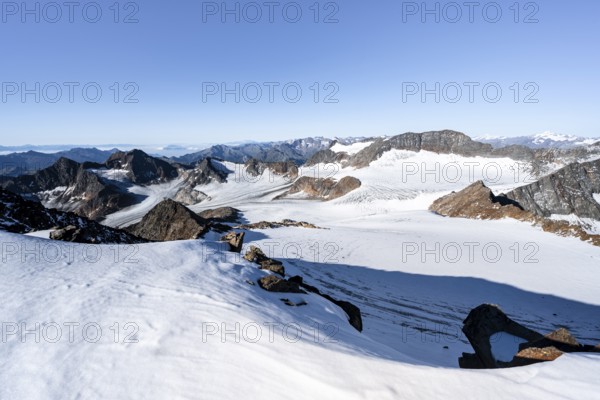 Snow on the Wilder Freiger mountain peak, picturesque high mountain landscape, view of Übeltalferner glacier and rocky mountain peaks Königshofspitz and Sonklarspitze, Stubai Alps, South Tyrol, Italy