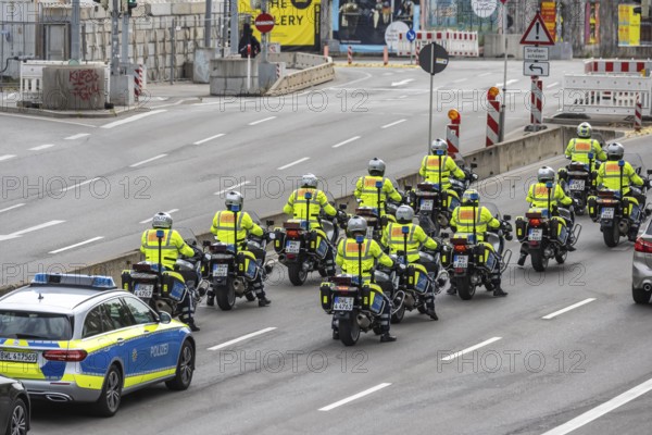 Police motorbike squadron driving through the construction sites of Stuttgart. Stuttgart, Baden-Württemberg, Germany