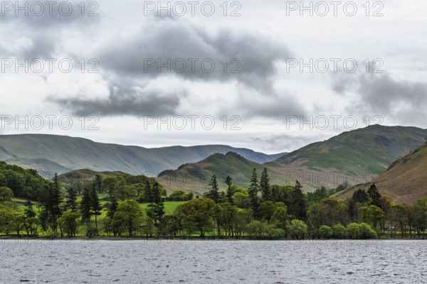 Farms and Mountains over Ullswater Lake, Lake District National Park, Cumbria, England, United Kingdom