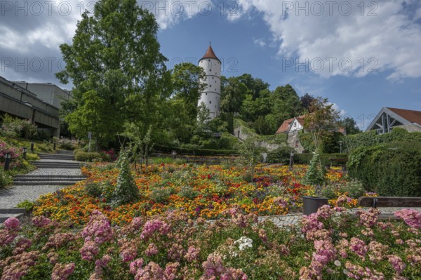 White tower on the Gigelberg, flowerbeds in front, Biberach an der Riß, Baden-Württemberg, Germany