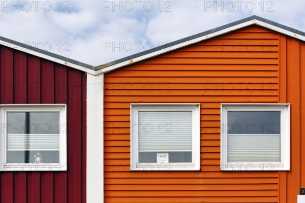 Colourful lobster huts, wooden façade with three windows, façade detail in the harbour, Heligoland, Schleswig-Holstein, Germany