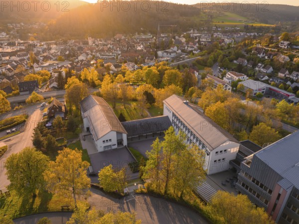 View over a cityscape at sunset with striking buildings, Nagold, Black Forest, Germany