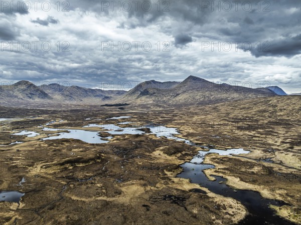 Rannoch Moor from a drone over Loch Ba and Loch of the Armpit, A82 Highland Way, Argyll and Bute, West Highlands, Scotland, United Kingdom