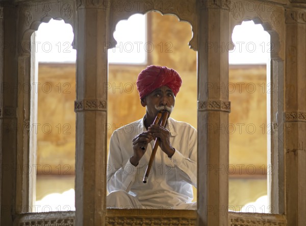 Rajasthani folk musician with an alghoza or bamboo flute, Jaisalmer, Rajasthan, India