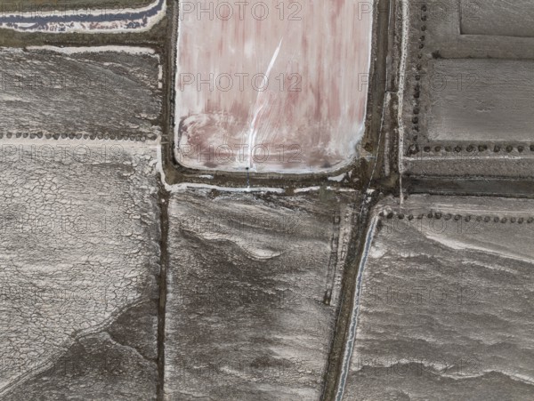 Saline ponds at the salt works of Walvis Bay. Aerial view. Drone shot. Namibia
