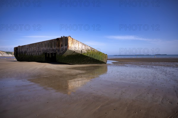 Phoenix Caissons, concrete boxes, caissons, were used in the sea as breakwaters and to form an improvised harbour, Mulberry B Harbour, Mulberry Harbour, Port Winston, Gold Beach, beach, D-Day, Operation Overlord, Arromanches-les-Bains, Normandy, Calvados, France