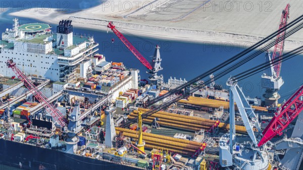 Pioneering Spirit. Workboat of the Swiss offshore service provider Allseas. The world's largest workboat for laying pipelines. It is the largest ship ever built in terms of gross tonnage and width. It is 382 metres long and 123 metres wide. From the end of 2018, it was busy laying the Nord Stream 2 pipeline in the Baltic Sea. Maasvlakte 2 deep-sea harbour, Rotterdam, Zuid-Holland, Netherlands