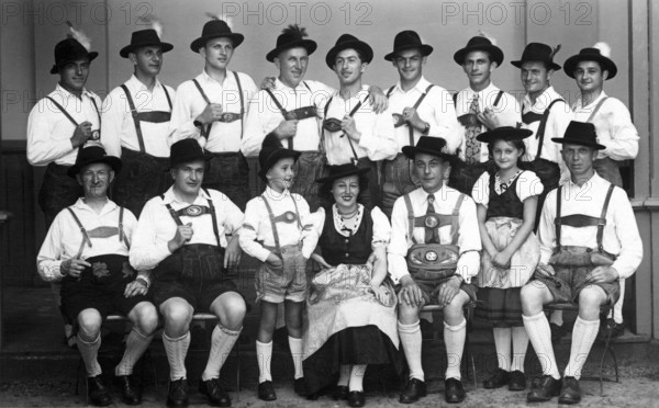 Traditional traditional costume groupTirolerhut, 1930s, A group of men and a woman in traditional costume pose for a group photo, Historical photo