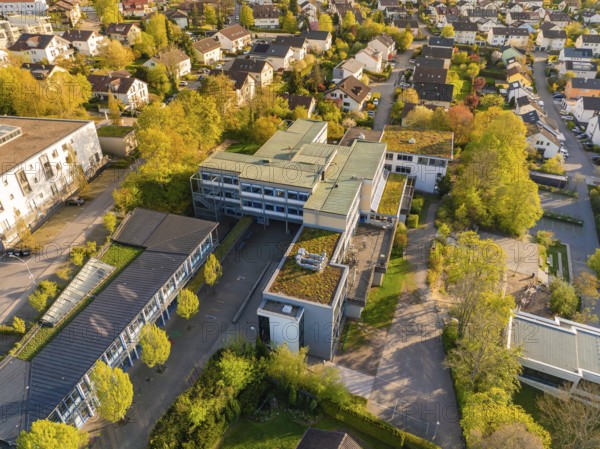 Urban planning view with modern structures and natural elements on the roofs, Christiane Herzog Realschule, Nagold, district of Calw, Germany