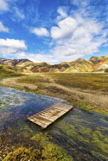 Volcanic landscape, colourful rhyolite mountains, ford, Cumulus, Landmannalaugar, remote hiking area in Fjallabak nature reserve, Laugavegur hiking trail, Suðurland, Sudurland, Icelandic highlands, Iceland