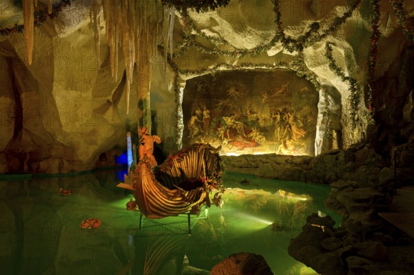Venus Grotto by King Ludwig II, artificial stalactite cave, lake with boat, painting Tannhäuser bei Frau Venus by August von Heckel, park of Linderhof Castle, UNESCO World Heritage Site, Ettal, Unterammergau, Garmisch-Partenkirchen, Upper Bavaria, Bavaria, Germany