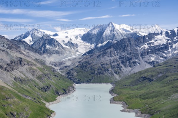 Blue mountain lake in a mountain landscape with glaciers, Lac des Dix reservoir and Mont Blanc de Cheilon peak, Valais Alps, Valais, Switzerland