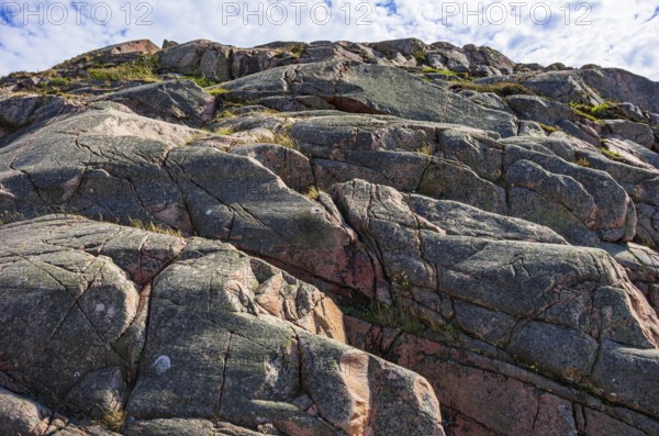 Rocky landscape of Bohusgranite on the coast of Lysekil, Bohuslän, Västra Götalands län, Sweden, Scandinavia
