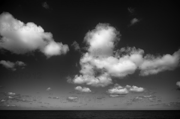 View of the sea, sky, Atlantic Ocean, clouds, Étretat, Normandy, Seine-Maritime, black and white, France