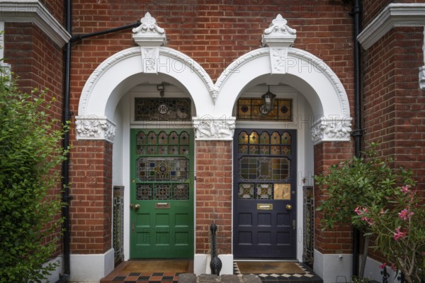Victorian house entrances, blue and green doors, brick building, Kensington, London, England, Great Britain
