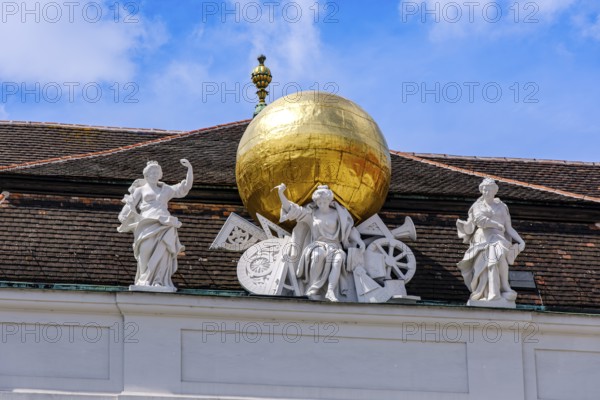 Allegorical sculpture group, Gaia with instruments for surveying the earth on the roof cornice of the Austrian National Library on Josefsplatz in the Vienna Hofburg Imperial Palace, Vienna, Austria