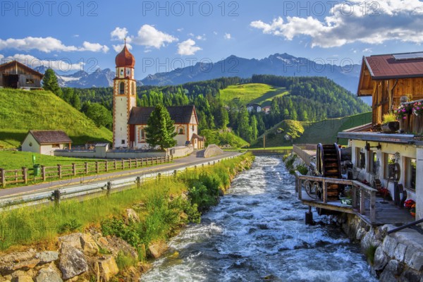 Chaplaincy church and old forge with water wheel on the Horlachbach, Niederthai in the Horlach Valley, side valley of the Ötztal, Stubai Alps, Tyrol, Austria