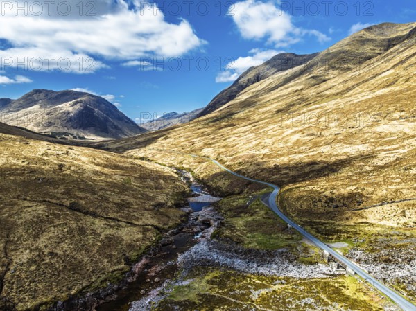 Mountains and Moors over Glen Etive Valley from a drone, Buachaille Etive Mòr, The Buachaille, Highlands, Scotland, United Kingdom