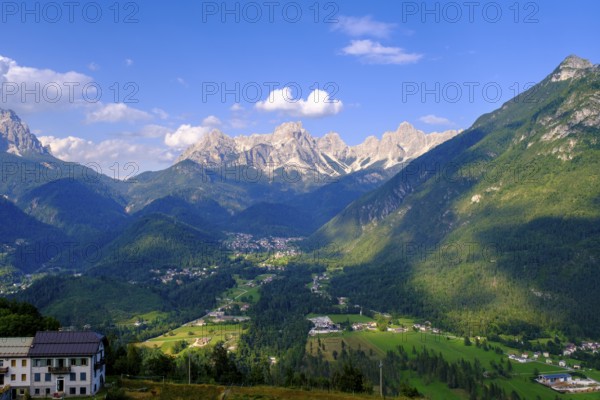 La Valle Agordina near Agordo, behind Framont, and Cima de la Gardesana, Belluno, Veneto, Italy